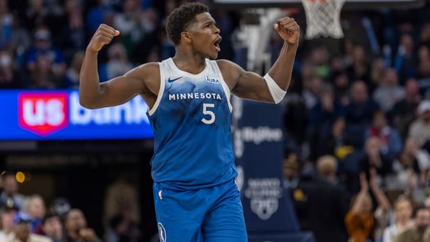 Dec 21, 2023; Minneapolis, Minnesota, USA; Minnesota Timberwolves guard Anthony Edwards (5) celebrates after making a shot against the Los Angeles Lakers in the second half at Target Center.